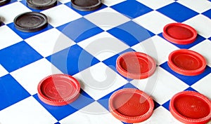 Close up of a checkers board