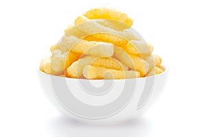 Close up of Cheese Potato Puff Snacks sticks, Popular Ready to eat crunchy and puffed snacks sticks  cheesy salty pale-yellow