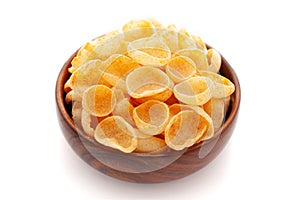 Close up of Cheese Puff Snacks cream color, Popular Ready to eat crunchy and puffed snacks cheesy salty pale-yellow color over