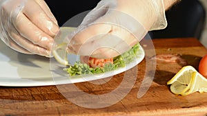 Close-up of chef hands cooking and preparing Asian food . Rack focus