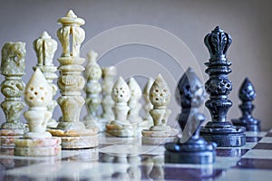 Close-up of chess pieces on chessboard