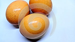 Close-up chicken eggs isolated on white background