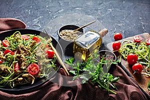 Close-up of chicken zucchini noodles tomato salad