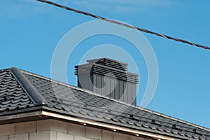 Close up chimney on the roof red brick