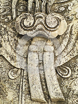 Close up Chinese stone statue in Wat Pho, Bangkok, Thailand