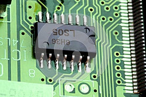 Close-up chip on green motherboard