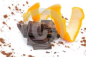 Close-up of chocolate pieces with orange