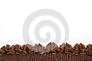 Close Up Chocolate Torte Cake in Raw with Cream Decorations. Isolated withText Space.