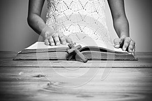 Close-up of a christian woman reading the bible.