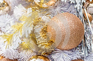 Close up christmas balls and decorations on chrismas tree.