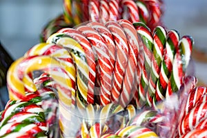 Close-up of christmas caramel cane in packaging on counter