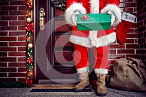 Close up of Christmas gift in Santa Claus hands, concept