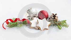 Close up of christmas homemade star cookies over white fluffy background. Christmas decoration.