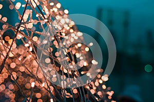 Close up of Christmas LED warm lights with bokeh lights on background, copy space