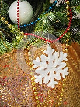 Close up christmas tree traditional decorations at home in selective focus.