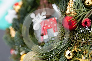 Close Up of a Christmas Wreath With Ornaments