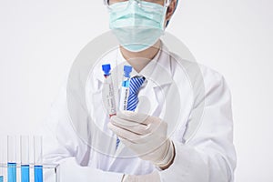 Close up of cientist is testing and researching some blue liquid chemical in laboratory isolated white background