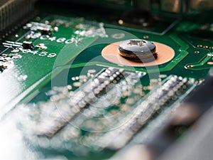 Close-up of circuit board with integrated circuits, resistors and capacitors