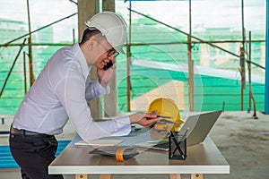 Close up Civil engineer is inspecting in building site