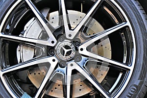 Close up of a CLA coupe mercedes wheel with alloy wheels and Continental tire.