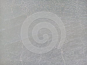 Cracked white plastic.