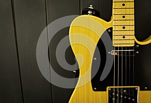 Close-up of classic electric guitar, neck with frets, microphone and steel strings photo