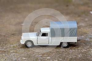 Close-up of classic miniature Peugeot 404 pick-up.