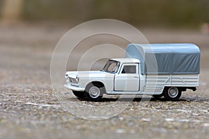 Close-up of classic miniature Peugeot 404 pick-up.