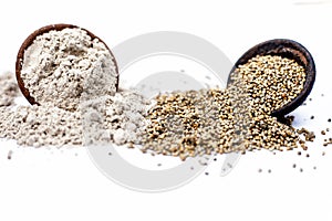 Close up of clay bowl of barley or pearl millet with its flour in a another bowl isolated on white.