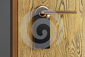 Close up of clean black sign on wooden door. 3D Rendering