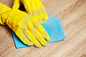 Close Up cleaning company worker hand holding sponge