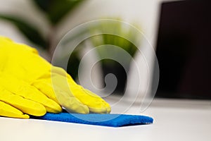 Close Up cleaning company worker hand holding sponge