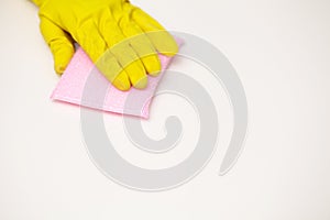 Close Up cleaning company worker hand holding sponge