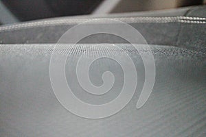 Close up of a cloth seat sports car