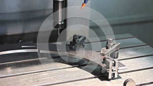 Close-up CNC Machine milling drilling steel part