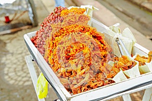 Close up of cocada, a traditional coconut dessert sold usually on the streets, made of grated coconut and brown sugar