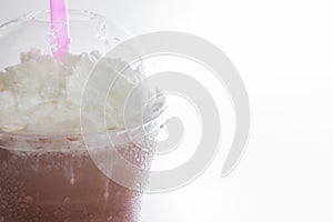 Close-up cocoa milkshake topping with whipping cream