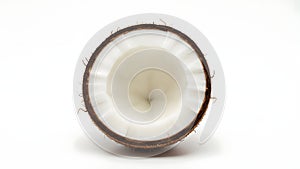 A half of a coconut on a white background (ai generated)