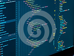Close up coding on screen. Splitting of html and css in the code editor. Web development