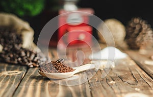 Close up coffee bean on Coffee grind under spoon, vintage