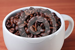 Close Up Of Coffee Bean Within Large Cup