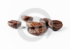 Close up on coffee beans white background