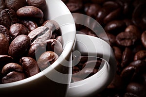 Close-up coffee cup with coffee beans