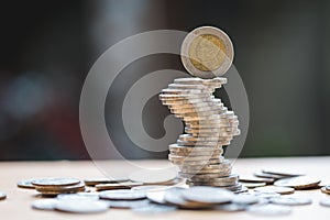 Close up of coins to stack of coins, Business Growth concept, T
