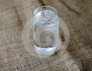 Close up, Cold drinking water with ice in a clean glass, drink healthy and cool down