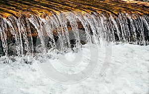 Close up of cold fresh water from mountain river, rapids, whitewater