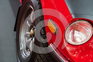 Close up Color detail on the headlight of a vintage car