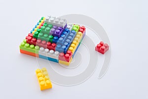 Close up color plastic block is build on white background copy space. Business and finance strategy, teamwork, business management