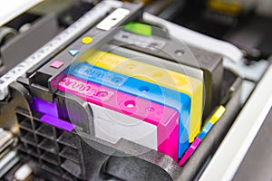 Close up color printer ink jet cartridge of the printer