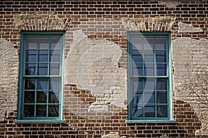 Close up of the color windows of a colonial era home